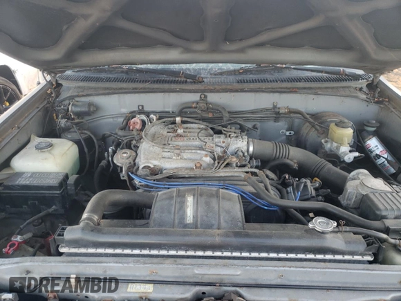 1993 Toyota T100 z VIN JT4VD10C5P0002752, wystawiony jako Copart lot #79648324 z przebiegiem 173 815 mil mil oraz Czysty tytuł • Clean title. Historia ofert i sprzedaży dostępna na DreamBid. Obrazek 11.