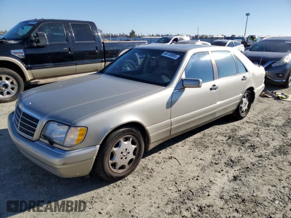 1996 Mercedes-Benz S with VIN WDBGA43E9TA311921, listed as a Copart auction lot 88758965 with 141,035 mi miles and Salvage Title. Bid and sale history available at DreamBid. Image 1.