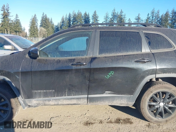 2014 Jeep Cherokee Latitude with VIN 1C4PJMCS7EW286546, listed as a IAAI auction lot 41398331 with 73,650 mi miles and . Bid and sale history available at DreamBid. Image 15.