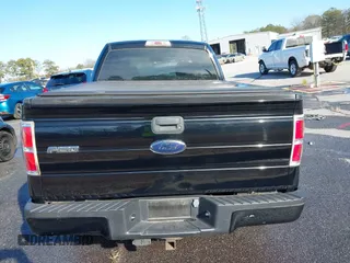 2009 Ford F-150 STX with VIN 1FTRX12WX9FA69251, listed as a IAAI auction lot 41341658 with 169,074 mi miles. Bid and sale history available at carsss.com. Image 16.