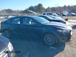 2015 Ford Fusion Titanium with VIN 3FA6P0D9XFR155040, listed as a IAAI auction lot 41423022 with 148,365 mi miles. Bid and sale history available at carsss.com. Image 14.