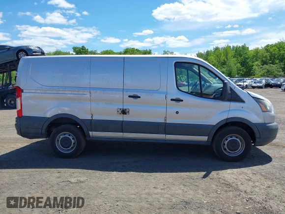 2015 Ford Transit Cargo with VIN 1FTNR1ZM5FKA40014, listed as a IAAI auction lot 42258737 with 177,501 mi miles and . Bid and sale history available at DreamBid. Image 13.