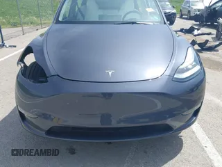 2023 Tesla Model Y Long Range z VIN 7SAYGDEE1PA158661, wystawiony jako IAAI lot #41983897 z przebiegiem 20 176 mil mil oraz . Historia ofert i sprzedaży dostępna na DreamBid. Obrazek 13.