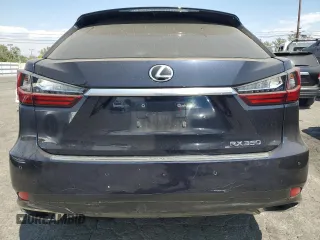 2020 Lexus RX with VIN 2T2AZMAA0LC164766, listed as a Copart auction lot 69867914 with 101,104 mi miles and Salvage Title. Bid and sale history available at carsss.com. Image 6.