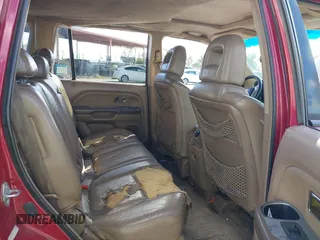 2005 Honda Pilot EX-L with VIN 2HKYF18545H544535, listed as a IAAI auction lot 42250692 with 232,994 mi miles and . Bid and sale history available at DreamBid. Image 8.