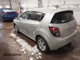 2014 Chevrolet Sonic LT with VIN 1G1JC6SB5E4234334, listed as a IAAI auction lot 41719050 with 118,755 mi miles. Bid and sale history available at carsss.com. Image 3.