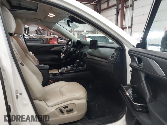 2020 Mazda CX-9 Touring z VIN JM3TCBCY8L0405360, wystawiony jako IAAI lot #41419428 z przebiegiem 69 917 mil mil oraz . Historia ofert i sprzedaży dostępna na DreamBid. Obrazek 5.