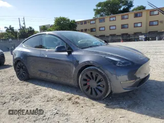 2022 Tesla Model Y Performance with VIN 7SAYGDEF9NF513648, listed as a Copart auction lot 55156475 with 29,280 mi miles and Non Repairable. Bid and sale history available at DreamBid. Image 4.