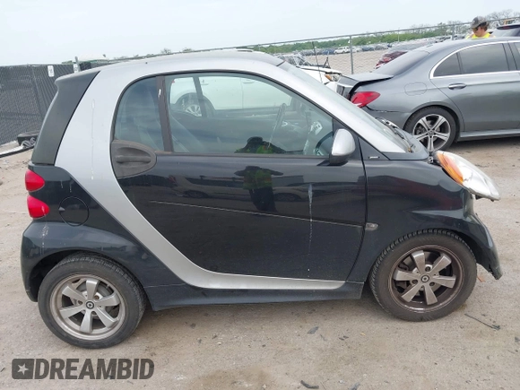 2013 Smart fortwo Pure with VIN WMEEJ3BA5DK620493, listed as a IAAI auction lot 42071086 with 85,883 mi miles and . Bid and sale history available at DreamBid. Image 14.