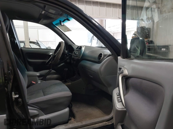 2001 Toyota RAV4 with VIN JTEGH20V810001120, listed as a IAAI auction lot 42671496 with 235,580 mi miles and . Bid and sale history available at DreamBid. Image 5.