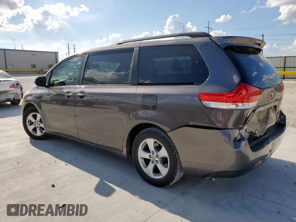 2014 Toyota Sienna LE AAS with VIN 5TDKK3DC8ES445454, listed as a Copart auction lot 62014095 with 143,601 mi miles and Salvage title. Bid and sale history available at DreamBid. Image 2.