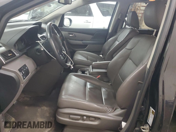 2015 Honda Odyssey EX-L with VIN 5FNRL5H62FB014772, listed as a Copart auction lot 55088925 with 144,152 mi miles and Salvage Title. Bid and sale history available at DreamBid. Image 7.