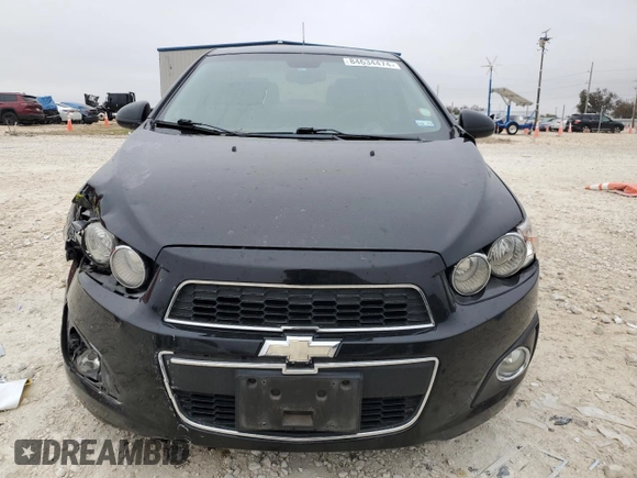2012 Chevrolet Sonic LTZ z VIN 1G1JE5SB2C4173638, wystawiony jako Copart lot #84634474 z przebiegiem 148 247 mil mil oraz Szkoda całkowita • Salvage title. Historia ofert i sprzedaży dostępna na DreamBid. Obrazek 5.