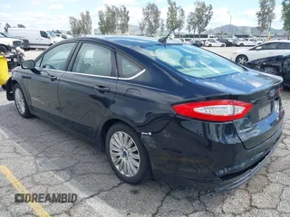 2015 Ford Fusion SE Hybrid with VIN 3FA6P0LU7FR199065, listed as a IAAI auction lot 41944181 with 197,020 mi miles. Bid and sale history available at carsss.com. Image 3.