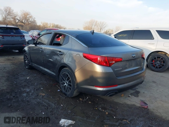 2013 Kia Optima LX with VIN 5XXGM4A77DG166140, listed as a IAAI auction lot 41881144 with 185,391 mi miles. Bid and sale history available at carsss.com. Image 3.
