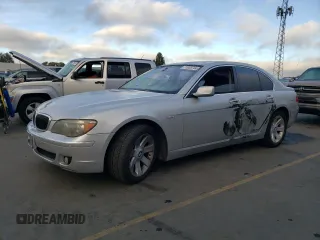 2006 BMW 7 Series 750i with VIN WBAHL83586DT05258, listed as a Copart auction lot 77033744 with 129,376 mi miles and Salvage Title. Bid and sale history available at carsss.com. Image 1.