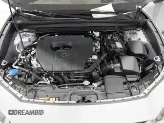 2025 Mazda CX-30 S Premium with VIN 3MVDMBDM5SM788786, listed as a IAAI auction lot 42126428 with 1,370 mi miles and . Bid and sale history available at DreamBid. Image 10.