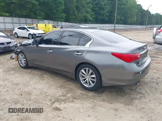 2015 Infiniti Q50 Premium with VIN JN1BV7AP7FM338434, listed as a IAAI auction lot 42158445 with 115,685 mi miles and . Bid and sale history available at DreamBid. Image 3.