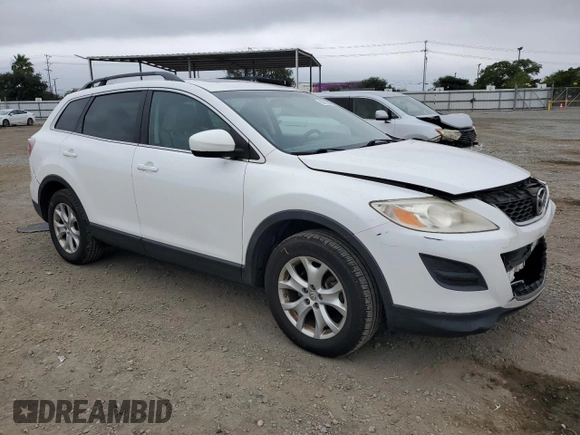 2012 Mazda CX-9 Touring with VIN JM3TB3CV3C0336043, listed as a Copart auction lot 59914335 with 106,595 mi miles and Salvage title. Bid and sale history available at DreamBid. Image 4.