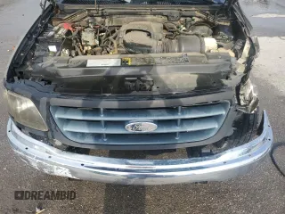 2003 Ford F-150 XL with VIN 1FTRX17LX3NA38576, listed as a Copart auction lot 54057495 with 173,811 mi miles and Salvage title. Bid and sale history available at DreamBid. Image 11.