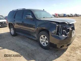 2011 GMC Yukon SLE with VIN 1GKS2AE01BR358079, listed as a Copart auction lot 68668824 with 185,739 mi miles and Salvage Title. Bid and sale history available at carsss.com. Image 4.