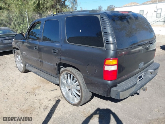 2003 Chevrolet Tahoe LT with VIN 1GNEC13T23R289916, listed as a IAAI auction lot 41408918 with 95,711 mi miles. Bid and sale history available at carsss.com. Image 3.