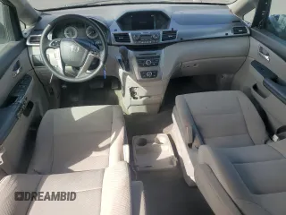 2015 Honda Odyssey LX with VIN 5FNRL5H27FB018491, listed as a Copart auction lot 54888445 with 129,488 mi miles and Salvage Title. Bid and sale history available at DreamBid. Image 8.