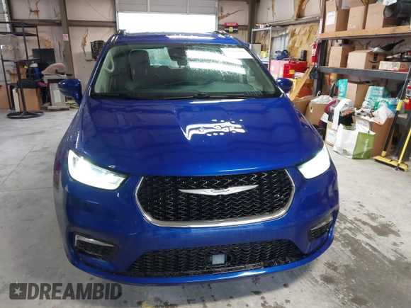 2021 Chrysler Pacifica Touring L z VIN 2C4RC1BGXMR503108, wystawiony jako IAAI lot #41914136 z przebiegiem 98 685 mil mil oraz . Historia ofert i sprzedaży dostępna na DreamBid. Obrazek 6.