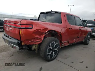 2023 Rivian R1T Adventure with VIN 7FCTGAAA2PN026211, listed as a Copart auction lot 77705414 with Not Provided miles and Salvage Title. Bid and sale history available at DreamBid. Image 3.