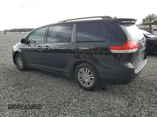2012 Toyota Sienna XLE AAS with VIN 5TDYK3DC1CS279236, listed as a Copart auction lot 63329165 with 143,937 mi miles and Salvage title. Bid and sale history available at DreamBid. Image 2.