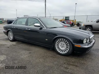 2006 Jaguar XJ Vanden Plas with VIN SAJWA82B96SH00699, listed as a Copart auction lot 55290355 with 192,937 mi miles and Clean Title. Bid and sale history available at DreamBid. Image 4.