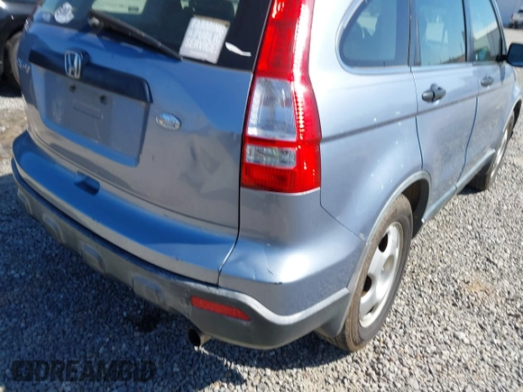 2007 Honda CR-V LX with VIN JHLRE38357C055256, listed as a IAAI auction lot 42050441 with 311,062 mi miles. Bid and sale history available at carsss.com. Image 6.