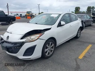 2011 Mazda 3 i Touring with VIN JM1BL1VF1B1402934, listed as a IAAI auction lot 42085662 with 162,473 mi miles and . Bid and sale history available at DreamBid. Image 2.