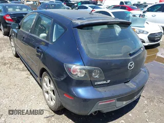 2009 Mazda Mazda3 s Touring with VIN JM1BK343091203101, listed as a IAAI auction lot 42036616 with 140,755 mi miles. Bid and sale history available at carsss.com. Image 3.