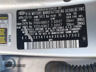 2014 Kia Sorento LX with VIN 5XYKT4A63EG457302, listed as a IAAI auction lot 41859779 with 122,724 mi miles. Bid and sale history available at carsss.com. Image 9.