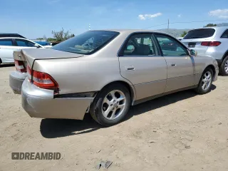 2001 Lexus ES 300 with VIN JT8BF28G210342201, listed as a Copart auction lot 55067975 with 235,165 mi miles and Salvage Title. Bid and sale history available at DreamBid. Image 3.