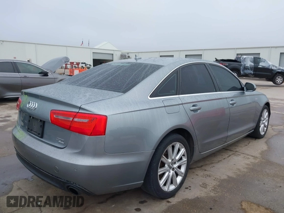 2013 Audi A6 3.0T Premium Plus with VIN WAUGGAFC4DN089255, listed as a IAAI auction lot 41509432 with 134,223 mi miles. Bid and sale history available at carsss.com. Image 4.