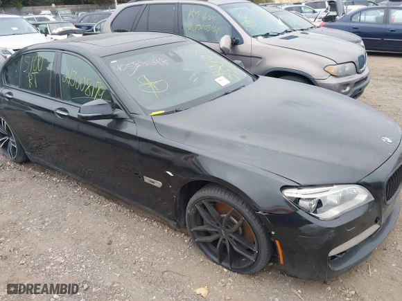 2015 BMW 7 Series 750i xDrive with VIN WBAYB6C57FD965802, listed as a IAAI auction lot 40588698 with 999,999 mi miles. Bid and sale history available at carsss.com. Image 12.