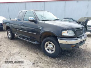 1999 Ford F-150 XL z VIN 1FTRX18L0XKB08799, wystawiony jako IAAI lot #42499615 z przebiegiem Nie podano mil oraz . Historia ofert i sprzedaży dostępna na DreamBid. Obrazek 1.