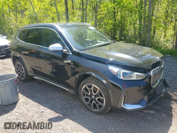 2023 BMW X1 xDrive28i with VIN WBX73EF04P5X86962, listed as a Copart auction lot 57575815 with 95,965 mi miles and Salvage title. Bid and sale history available at DreamBid. Image 4.