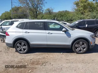2018 Volkswagen Tiguan SEL Premium with VIN 3VV5B7AX5JM004713, listed as a IAAI auction lot 40498843 with 92,256 mi miles and . Bid and sale history available at DreamBid. Image 13.