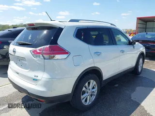 2014 Nissan Rogue SV with VIN 5N1AT2MT2EC812574, listed as a IAAI auction lot 41974060 with 101,017 mi miles and . Bid and sale history available at DreamBid. Image 4.