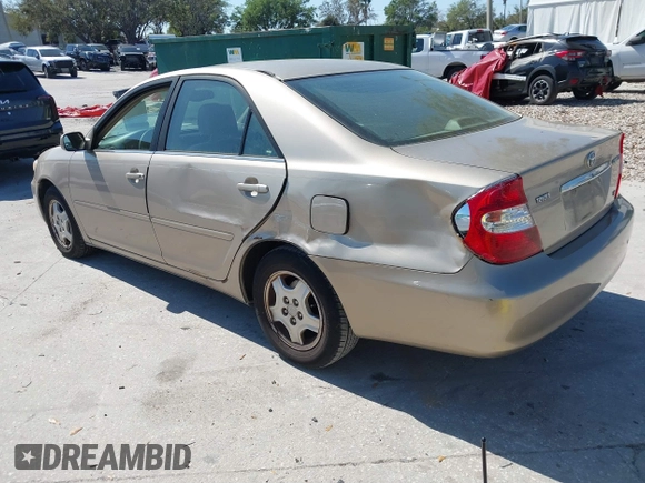 2002 Toyota Camry XLE z VIN 4T1BF30K82U018974, wystawiony jako IAAI lot #41712857 z przebiegiem 236 353 mil mil oraz . Historia ofert i sprzedaży dostępna na DreamBid. Obrazek 3.