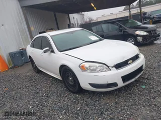 2013 Chevrolet Impala Police with VIN 2G1WD5E33D1210058, listed as a IAAI auction lot 41574143 with 156,643 mi miles. Bid and sale history available at carsss.com. Image 1.