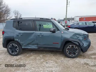 2015 Jeep Renegade Trailhawk z VIN ZACCJBCT4FPB79254, wystawiony jako IAAI lot #41965451 z przebiegiem 87 398 mil mil oraz . Historia ofert i sprzedaży dostępna na DreamBid. Obrazek 13.