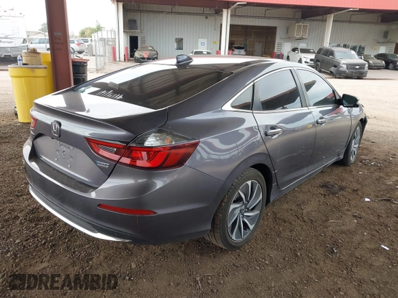 2020 Honda Insight Touring with VIN 19XZE4F94LE007115, listed as a IAAI auction lot 41819370 with 53,774 mi miles and . Bid and sale history available at carsss.com. Image 4.