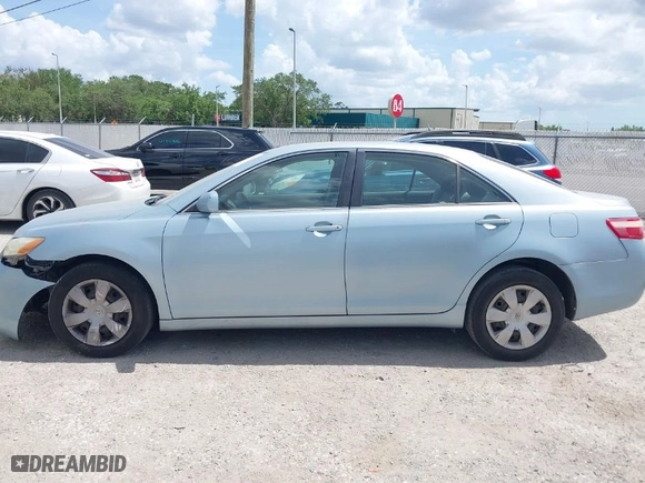 2007 Toyota Camry CE with VIN 4T1BE46KX7U520800, listed as a IAAI auction lot 41919653 with 118,930 mi miles. Bid and sale history available at carsss.com. Image 15.