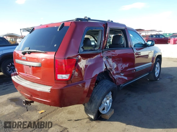 2008 Jeep Grand Cherokee Laredo with VIN 1J8GR48K08C233266, listed as a IAAI auction lot 41291164 with 159,208 mi miles. Bid and sale history available at carsss.com. Image 4.