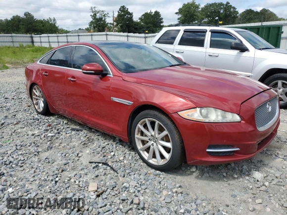 2013 Jaguar XJ with VIN SAJWJ1CD9D8V48888, listed as a Copart auction lot 62272685 with 166,533 mi miles and Clean title. Bid and sale history available at DreamBid. Image 4.