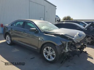 2015 Ford Taurus SEL z VIN 1FAHP2E86FG203425, wystawiony jako Copart lot #52261295 z przebiegiem 78 575 mil mil oraz Szkoda całkowita • Salvage title. Historia ofert i sprzedaży dostępna na DreamBid. Obrazek 4.